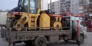 Перевозка дорожной техники манипулятором